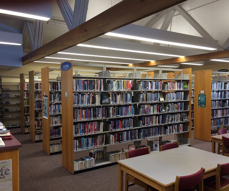 Whitman, MA Library stacks lit with linear LED fixtures
